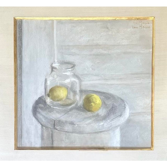 A vintage, framed still life watercolor painting. Features a jar with lemons on a marble table. Housed in a cerused oak...