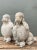 This pair of vintage cement poodle sculptures brings a traditional, whimsical charm to garden and patio design, channeling...