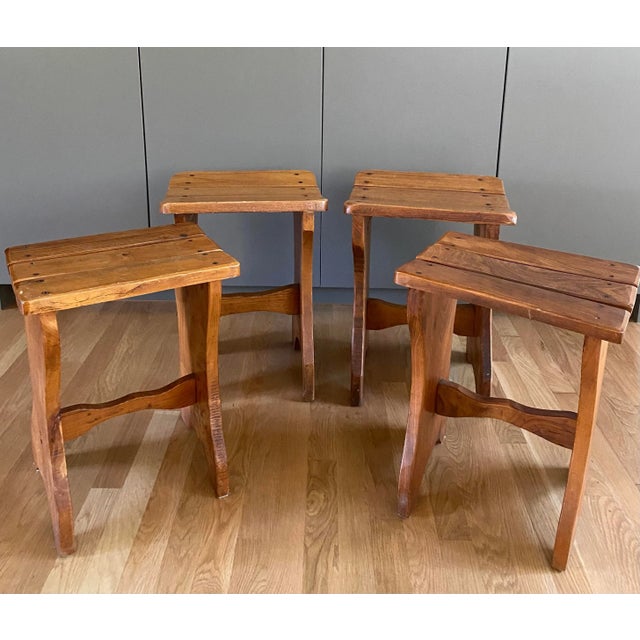 Pair of vintage wood British pub low stools with slatted seats. Two stools have curved seats and other 2 are flat. 2 sets...