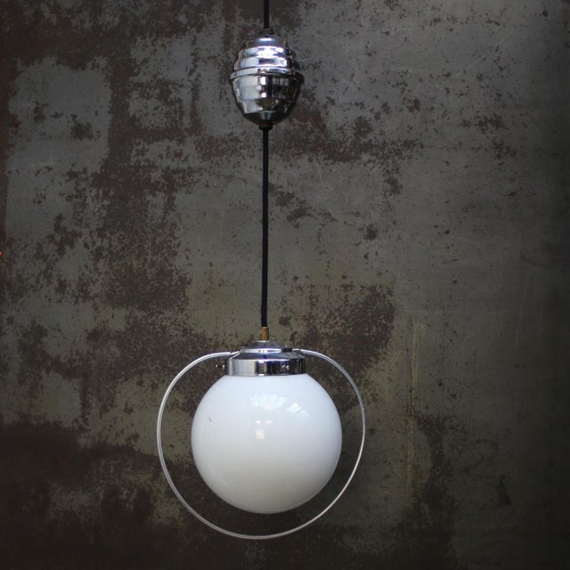 Opaline glass pendant Nickel plated metal with grip ring 2 meter black flex, including length adjustable mechanism...