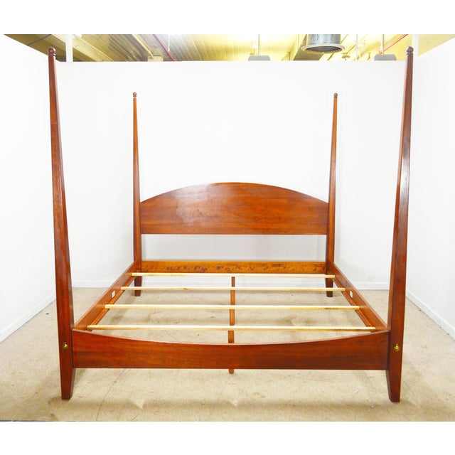 King Bed by Ethan Allen. Store item #575. It features pencil posts and solid wood construction.