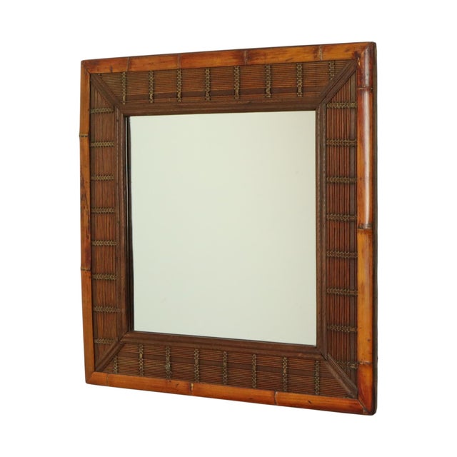 Vintage square mirror made of bamboo, rattan, and wood; an impressive mirror entirely in Bohemian style, second half of...