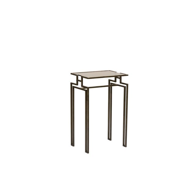 Inspired by the industrial lofts of new york, chelsea 29 table is crafted of sturdy iron with a bronzed finish. The...