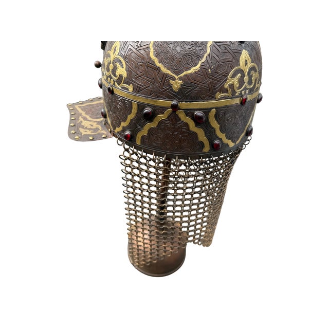 Based on the ceremonial armor of high-ranking Ottoman figures, this handcrafted copper helmet is a stunning convergence of...