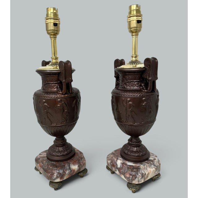 Stunning Pair of Grand Tour French Heavy Gauge Patinated Bronzed Townley Urns of compact proportions and outstanding...