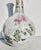 Japanese studio porcelain vase from the Meiji period. Beautiful painted details of tiny floral designs over the entire...