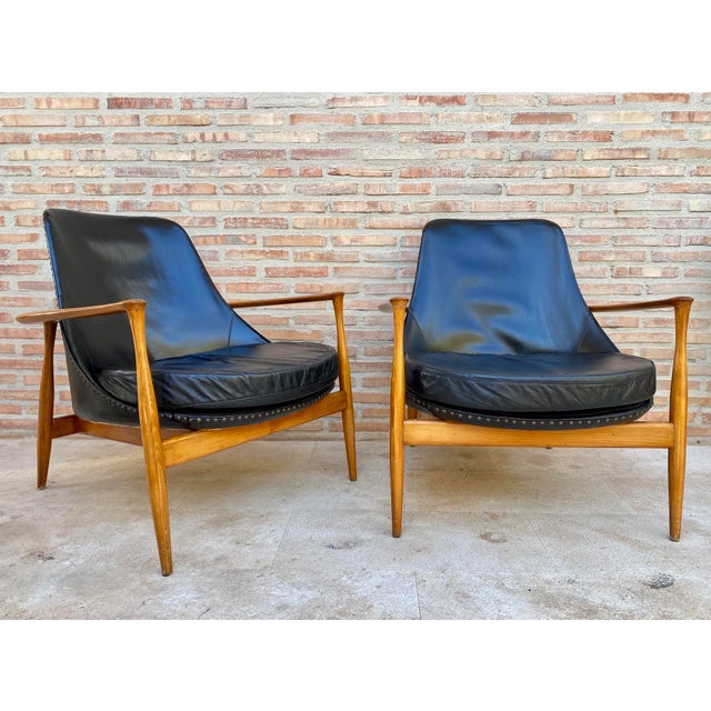 In style of Ib Kofod-Larsen Elizabeth Lounge Chair, Set of Two. Acclaimed design by Ib Kofod-Larsen Style, the sculptural...