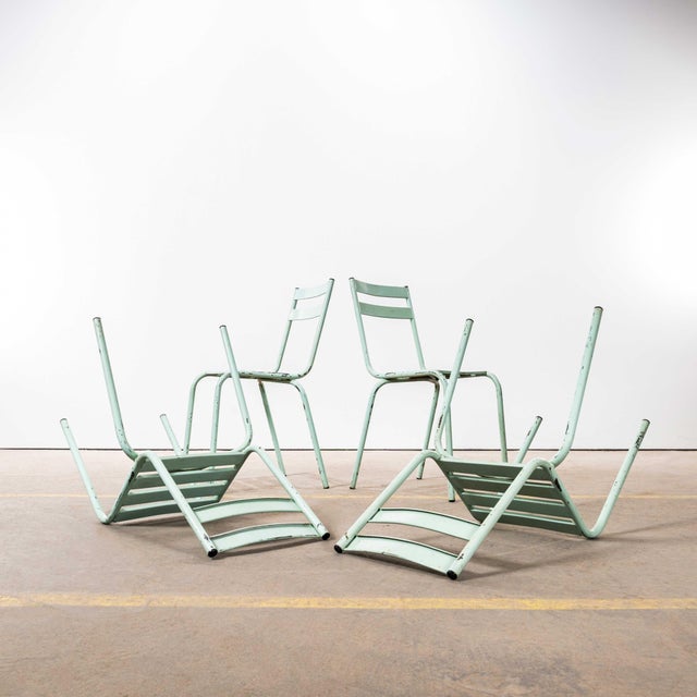 1950’s French ArtProg Light Green Metal Stacking Outdoor Chairs. Reminiscent of Tolix but not made by Tolix, ArtProg was a...