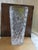 An exceptionally heavy and brilliant vintage clear cut crystal flower vase, presenting a timeless architectural...