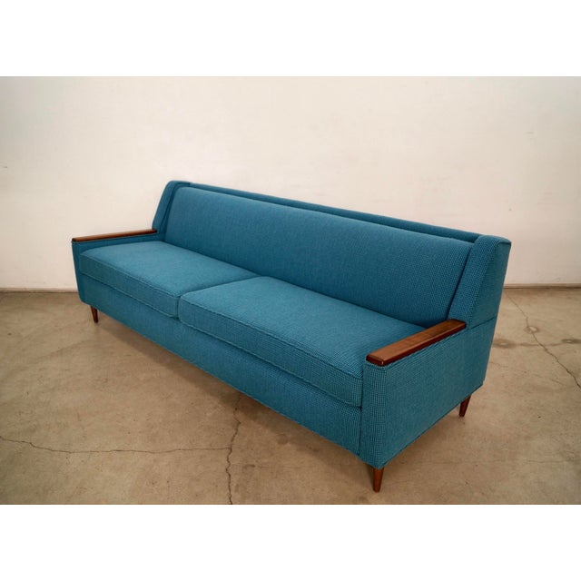 Vintage 1960's Mid Century Modern sofa for sale. It has been professionally reupholstered in Knoll Textiles' Cato fabric...
