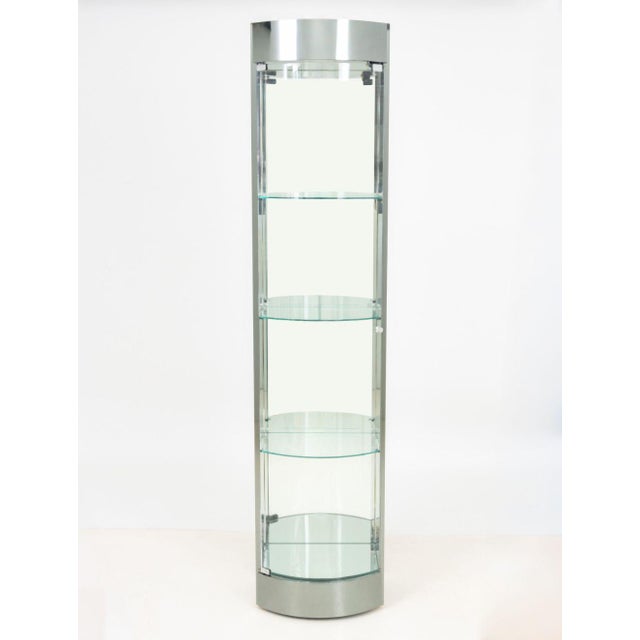 Modern Semi-Circular Chrome and Glass Display Cabinet, with the single door opening to three glass shelves with mirrored...