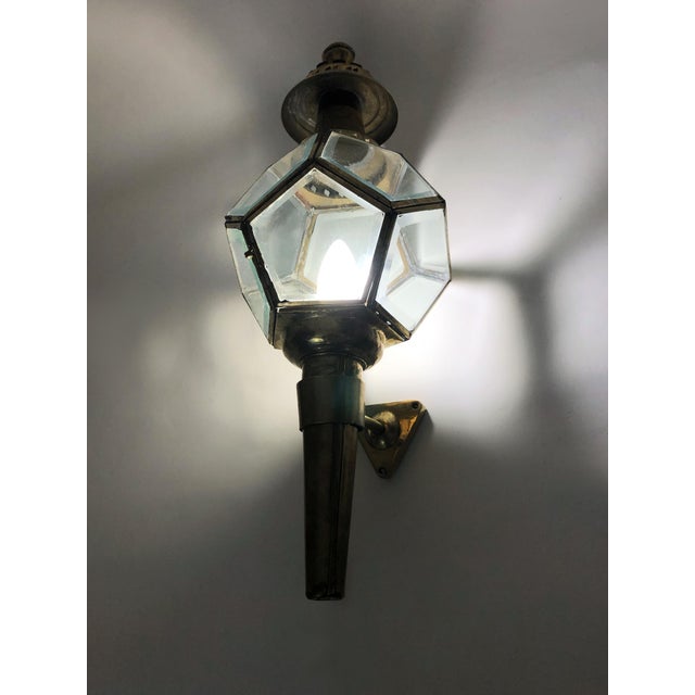 Pair of vintage carriage lantern wall sconces, electrified, 5-sided, in copper or brass. Antique pair of carriage lantern...