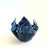 A vintage handmade pottery bowl in a lovely freeform handkerchief shape. Finished in blue glazes. Measures 4.5"W x 3.25"H