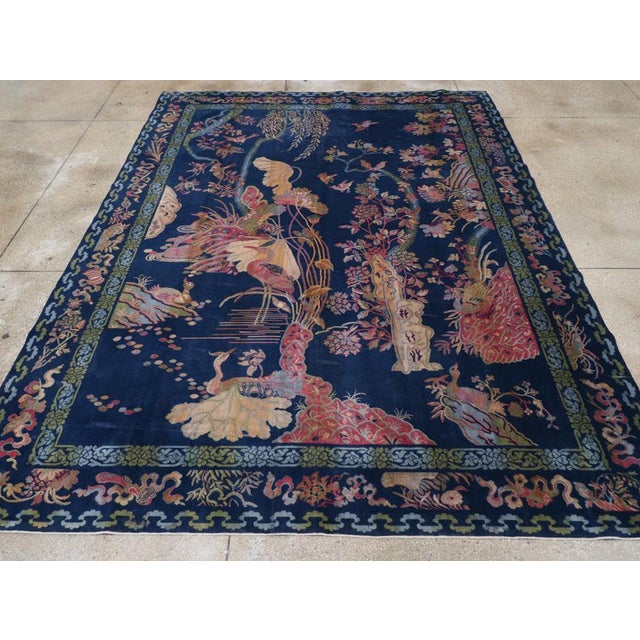 A Chinese Pictorial Peking Inspired English Axminster Room Size Carpet handmade during the Mid-20th century. Measures: 8'...