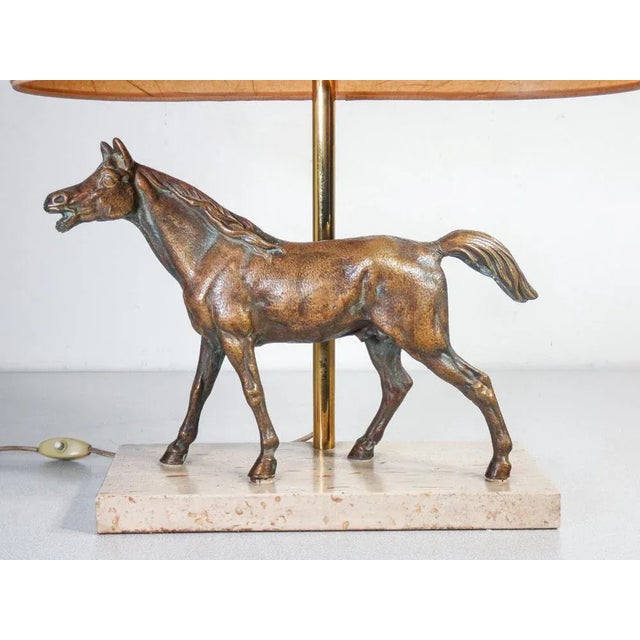Art Decò table lamp with bronze horse sculpture. Travertine base. First twentieth century Italy period early twentieth...