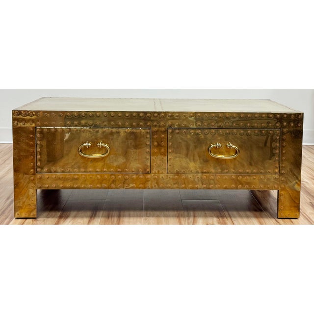 Substantial vintage brass two-drawer trunk with original lacquered finish covering wood frame, circa 1970. Finished on all...