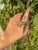 This is part of Chairish’s Fine Jewelry assortment. Emerald three stone ring in 18K gold with diamonds which perfectly...