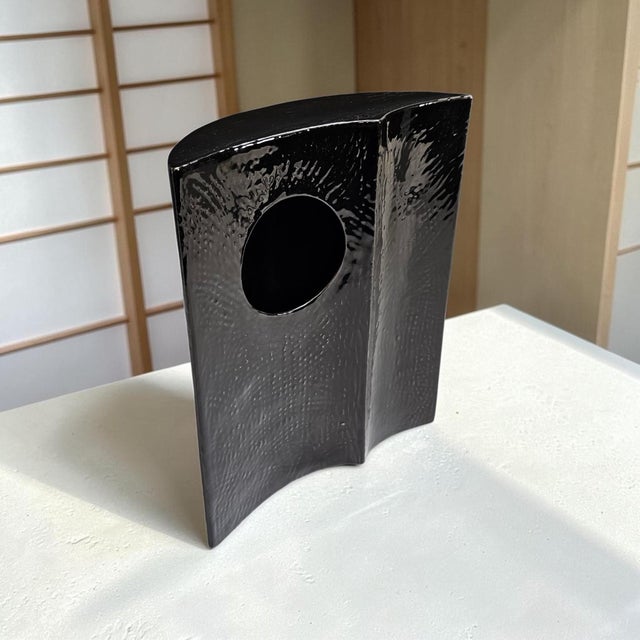 A late twentieth-century Japanese Ikebana vase dating to circa the 1970s–1980s, distinguished by its exceptionally narrow...