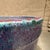 For your consideration, a vibrant ceramic flower pot featuring a striking drip-glaze finish. The design blends shades of...