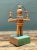 This vintage wood and metal found object sculpture brings whimsical folk-art charm to any collection, its playful humanoid...