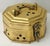 Handsome vintage brass hexagon shaped pierced cricket box with handle.