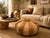 Bring warmth and authentic Moroccan character to your interior with this handcrafted leather pouf, made by skilled...