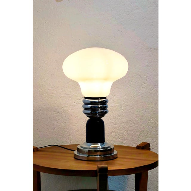 Tronconi lamp in excellent condition This piece is attributed to the mentioned designer/maker. It has no attribution mark...