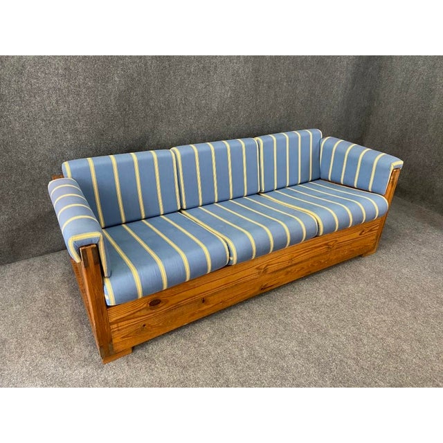 This solid pine sofa by This End Up Furniture Co. showcases a timeless farmhouse rustic design with sturdy wood...