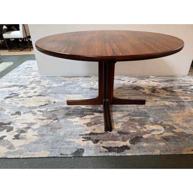 Design Plus Gallery presents a 48-inch Round Extension Dining Room Table with Zebra Wood Veneer. The compact table is...
