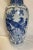 Vintage blue and white tall and stately porcelain/vase. One side has a mother and baby pheasant standing on a branch with...