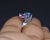 Gorgeous GIA certified natural 6.24CTS diamond and sapphire solid 950 platinum bypass ring. This ring features a very...