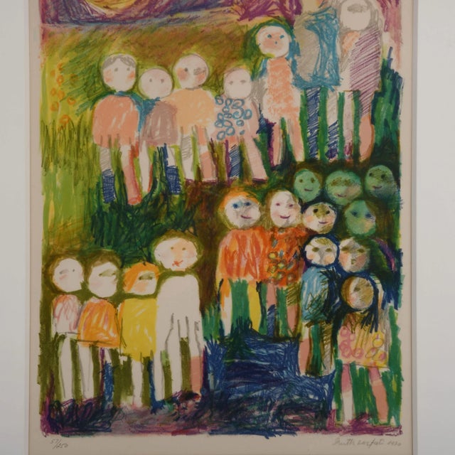 This Framed Signed Ruth Zarfati 1970 Limited-Edition (57/250) Lithograph depicts a vibrant gathering of abstract children,...