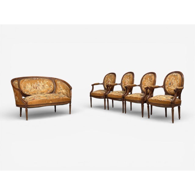 Louis XVI Style, Salon Suite, Tapestry, Walnut, France, 20th c. A walnut salon suite from 20th century France comprising...