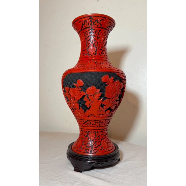 Up for sale is a very high quality vintage hand carved Chinese lacquer cinnabar vase. It's carved by hand out of black and...