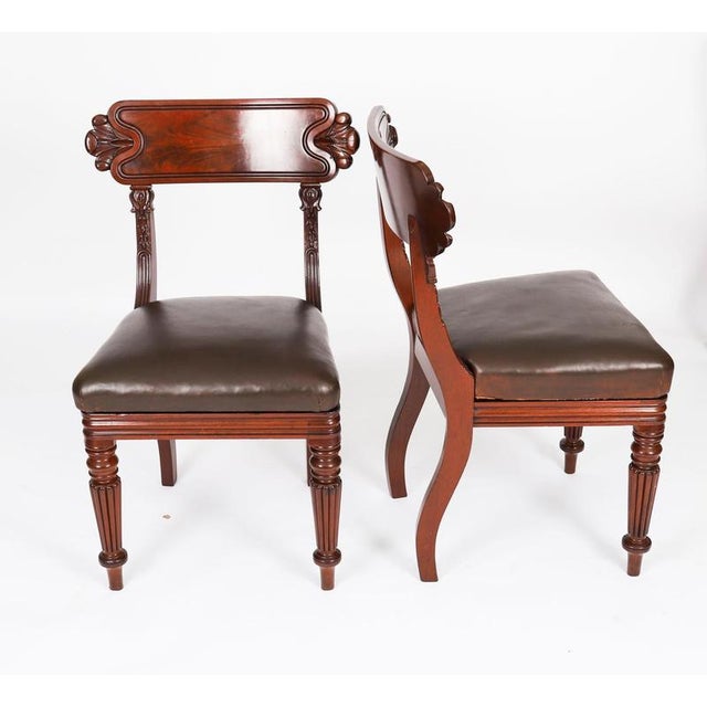 This is a fantastic set of eight antique english william iv flame mahogany bar back dining chairs, dating from circa 1830....