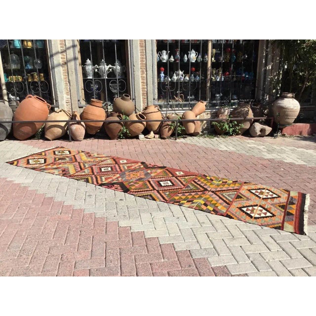 This beautiful, vintage, handwoven kilim is approximately 50 years old. It is handmade, of very fine quality hand spun...