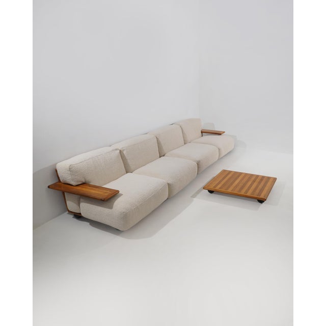 A “pianura” modular sofa designed by mario bellini for cassina in the early 1970s, a project in which generous upholstered...