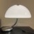Designed in 1965 by Elio Martinelli, the lamp is made with methacrylate molding techniques that were innovative for the...
