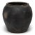 Sculpted during the early 20th century in China's Shanxi province, this terra cotta vessel has a smoky taupe-black...