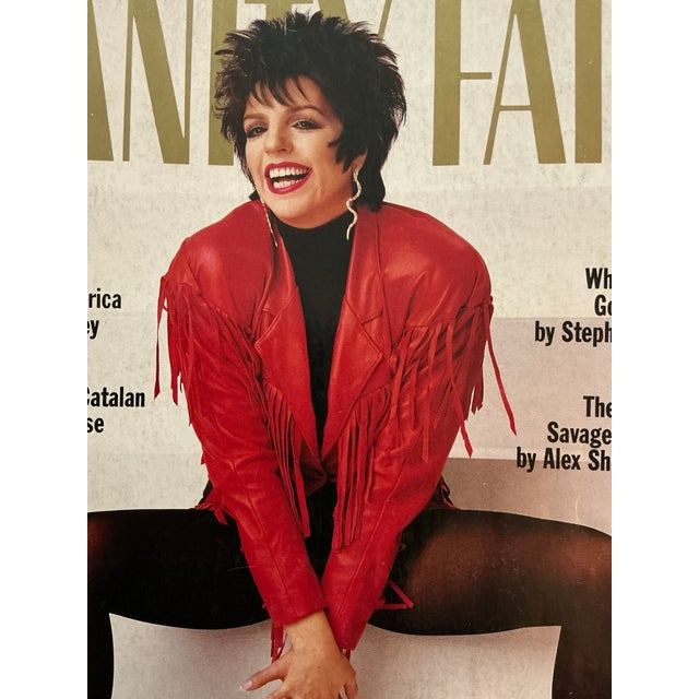 This is a June 1987 issue of Vanity Fair magazine featuring entertainer Liza Minnelli on the cover the cover story titled...