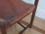 Mid-Century Imbuia chair designed by Brazilian designer Michel Arnoult. This sling chair has a rosewood frame with leather...