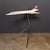 A vintage 20th century fibreglass and plastic composite model of a concorde in full british airways livery mounted on a...