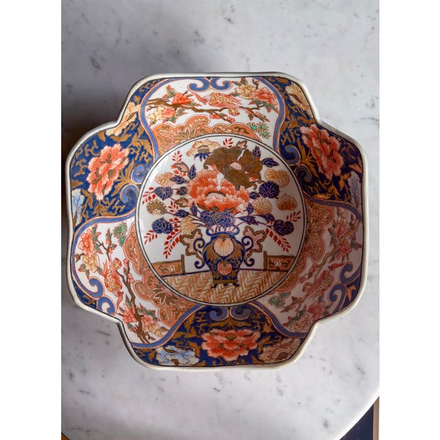 Antique Japanese Imari Porcelain Bowl | Meiji Period | Lobed Form | Flower Basket & Phoenix Panels For Sale - Image 4 of 8