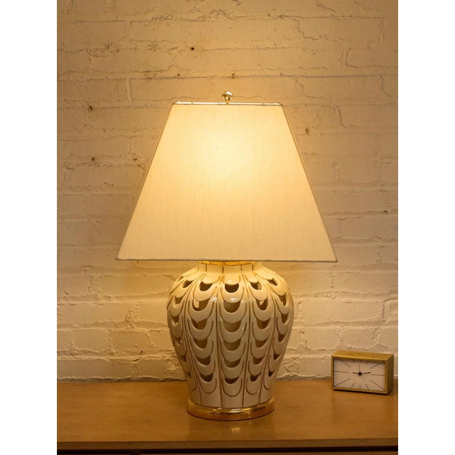 This stunning piece will add a touch of sophistication to any room in your home. The lamp will provide a warm and cozy...