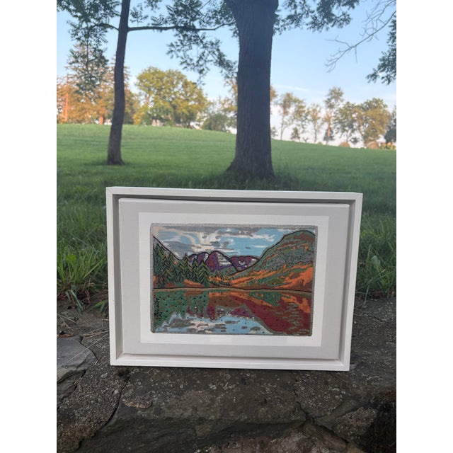 Approximate sight size: 7” x 10¼”. Professionally framed, matted, and sealed. This captivating mixed media work draws...