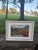 Approximate sight size: 7” x 10¼”. Professionally framed, matted, and sealed. This captivating mixed media work draws...