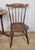 This is a beautiful kitchen chair, dating to the early 20th Century, with defining vintage features that are sure to...