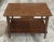 A Lane Furniture Mid Century Style Tiered Walnut Side Table. Solid Walnut frame with laminated Walnut top Measure 29.75"...