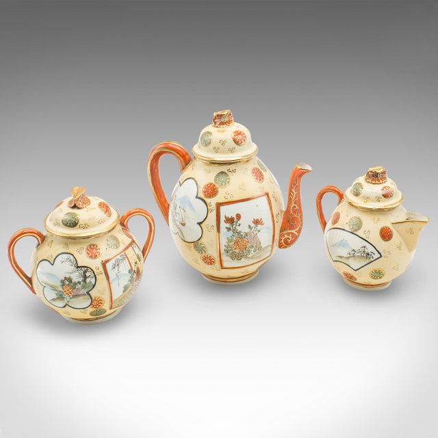 This is an antique Geisha tea set. A Japanese, handpainted ceramic teapot and cups service for four, dating to the early...