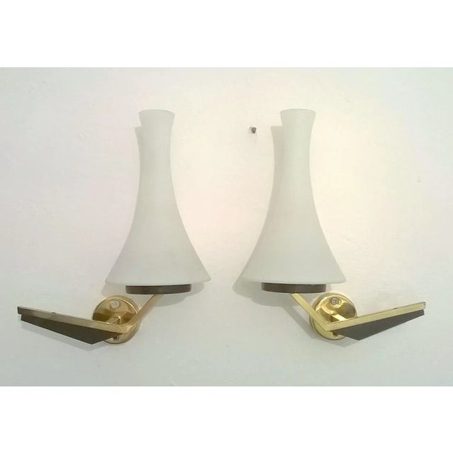 Set of two Stilnovo wall lights, made in Italy,1950s. Unusual and rare form. Opaline glass and brass. Original electric...